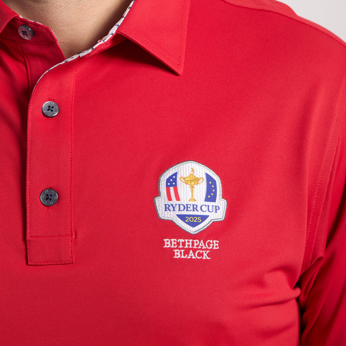 FootJoy 2025 Ryder Cup Solid Polo with Trophy Collar in Red - Logo Close Up