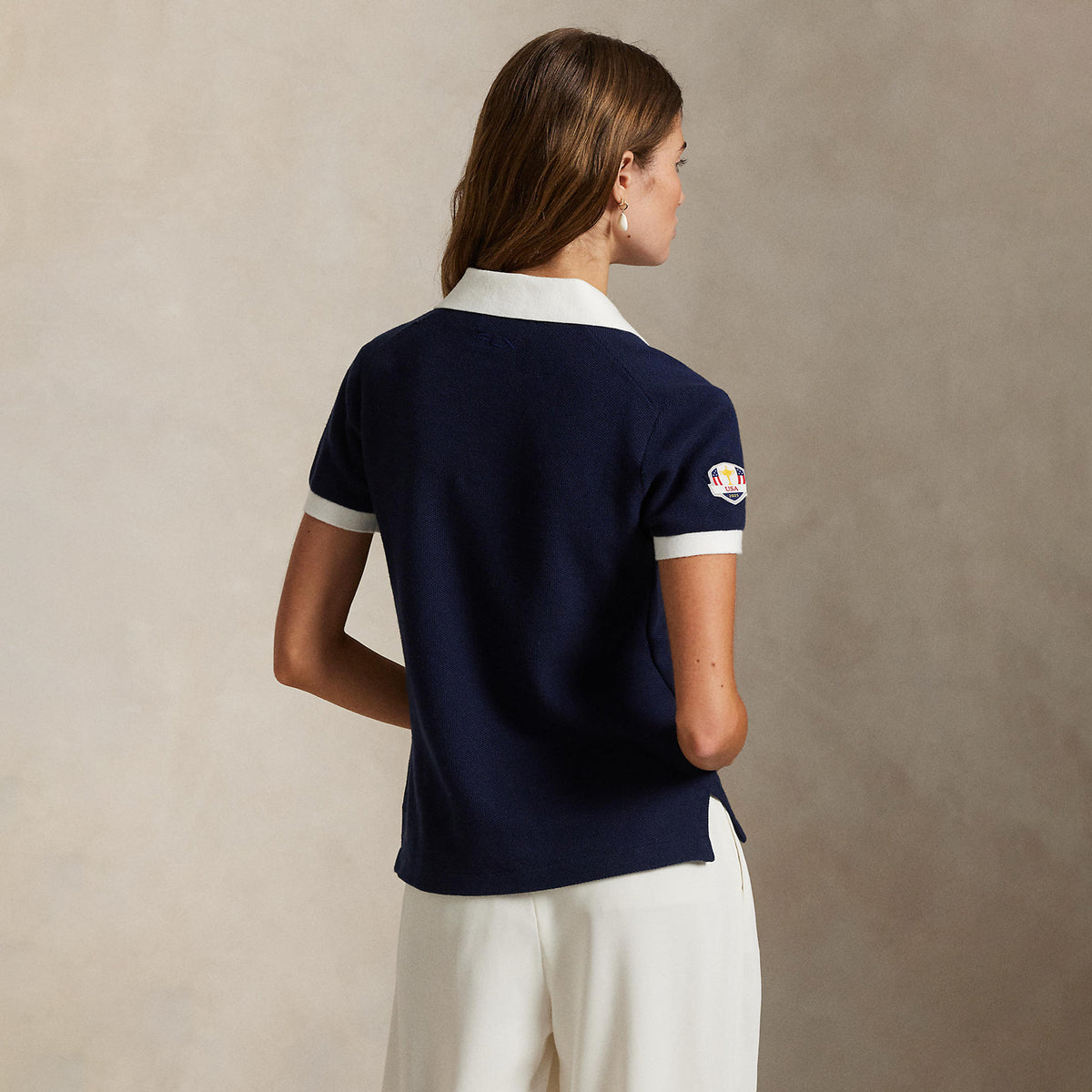 Ralph Lauren 2025 Ryder Cup U.S. Team Uniform Saturday Women&#39;s Knit Polo Shirt in Refined Navy - Modeled Back View